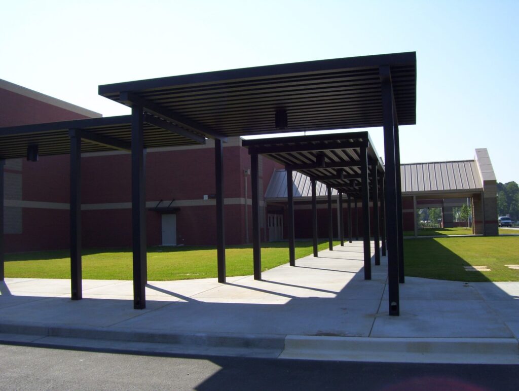 aluminum canopies covering school walkways